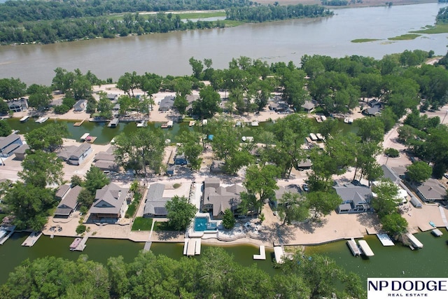 birds eye view of property with a residential view and a water view