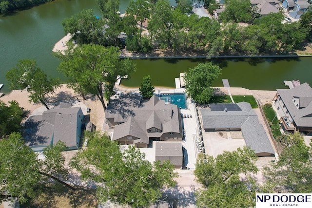 drone / aerial view featuring a residential view and a water view