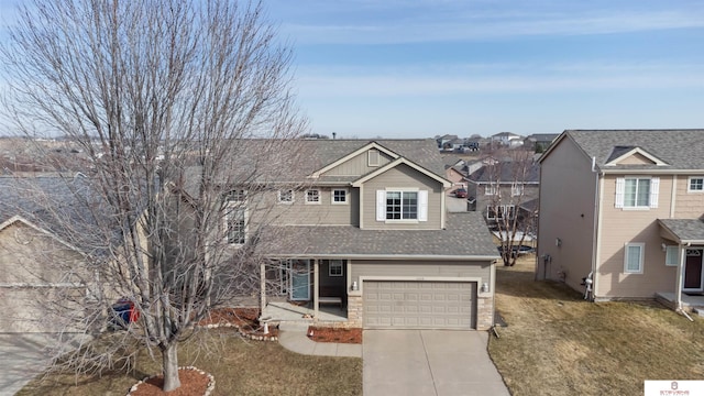 view of front of property featuring stone siding, a residential view, concrete driveway, a shingled roof, and a garage