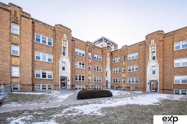 view of snow covered property