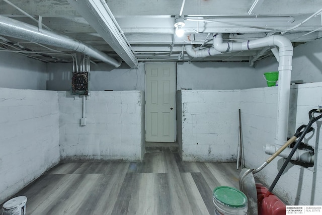 unfinished basement featuring wood finished floors