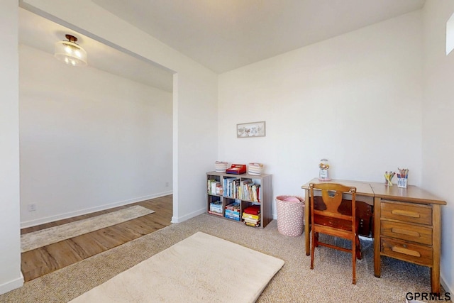 playroom with carpet and baseboards