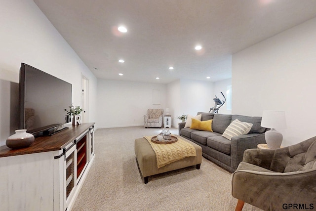 carpeted living room with recessed lighting