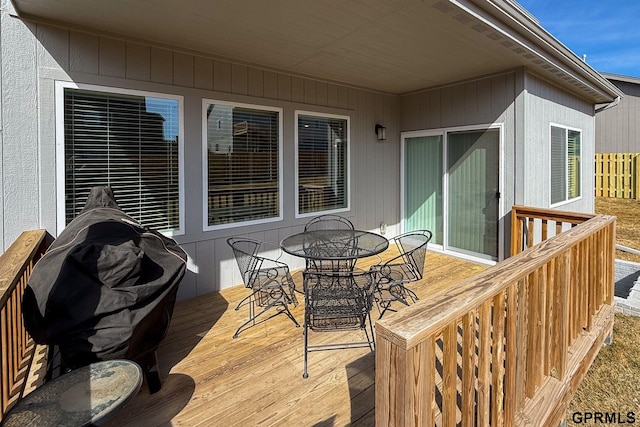 deck featuring outdoor dining space