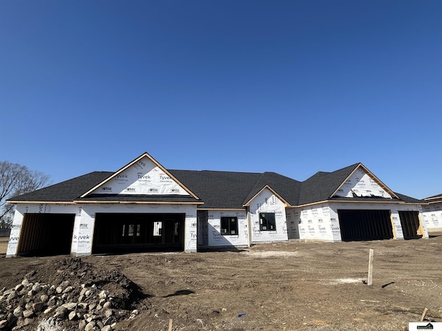 property under construction featuring a garage