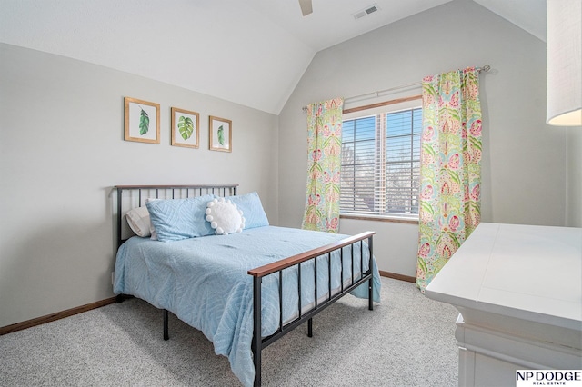 carpeted bedroom with a ceiling fan, vaulted ceiling, baseboards, and visible vents