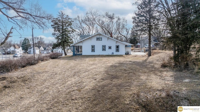 back of property with a residential view