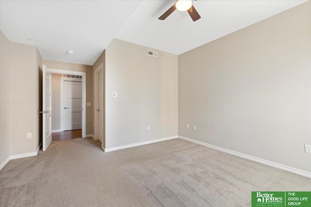 unfurnished bedroom featuring visible vents, carpet flooring, a ceiling fan, and baseboards