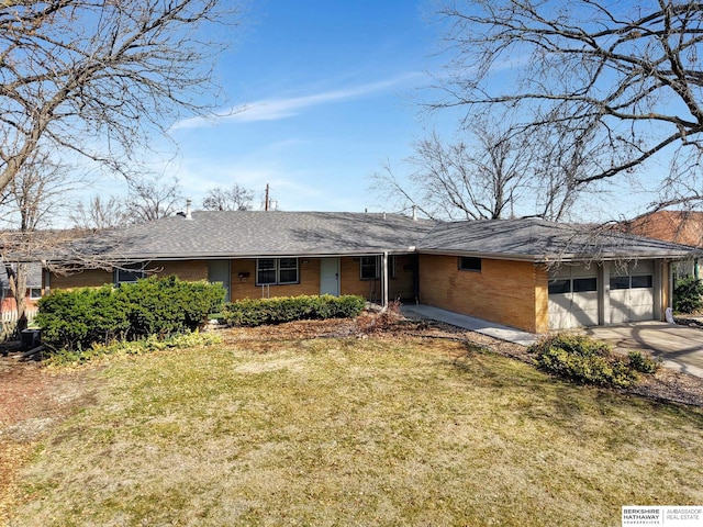 ranch-style house with driveway, an attached garage, a shingled roof, a front lawn, and brick siding