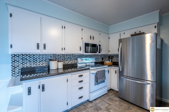 kitchen featuring ornamental molding, stone finish floor, tasteful backsplash, white cabinetry, and stainless steel appliances