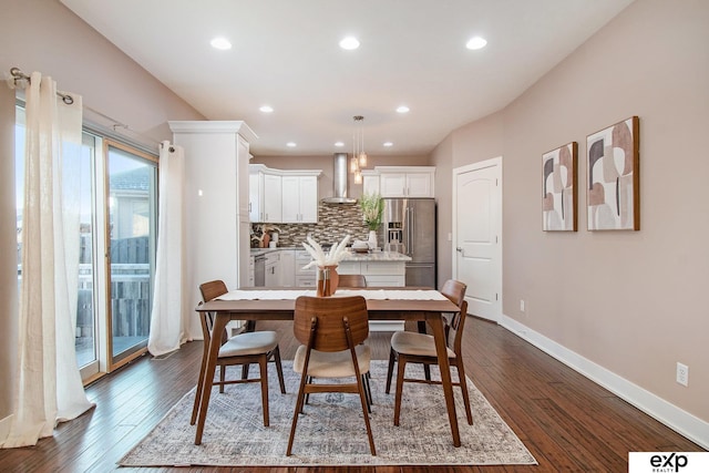 dining room with recessed lighting, baseboards, and dark wood-style floors