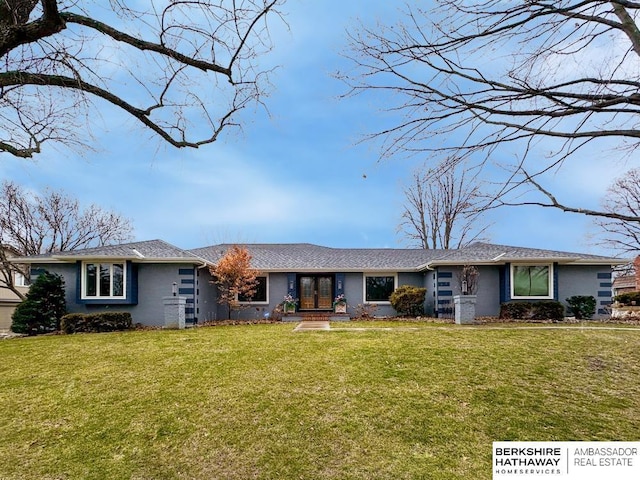 ranch-style home featuring a front yard