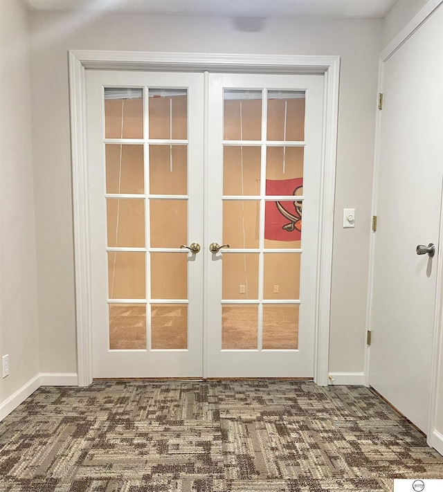 room details featuring carpet flooring and french doors