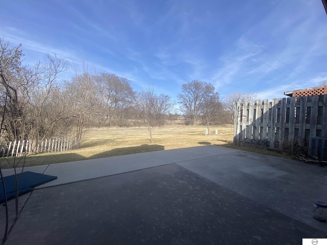 view of patio with fence