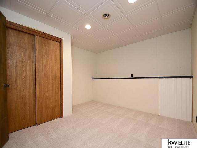 unfurnished bedroom featuring a closet, visible vents, recessed lighting, and carpet