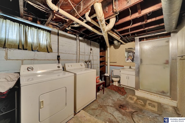 laundry room with independent washer and dryer and laundry area