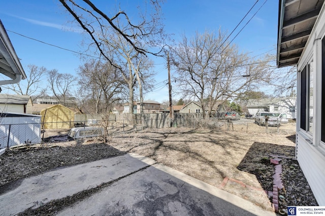 view of yard featuring a patio and fence