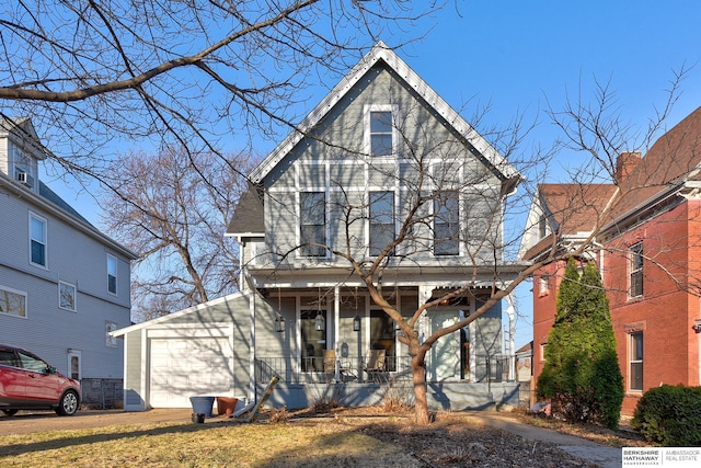 view of front of property featuring covered porch and driveway