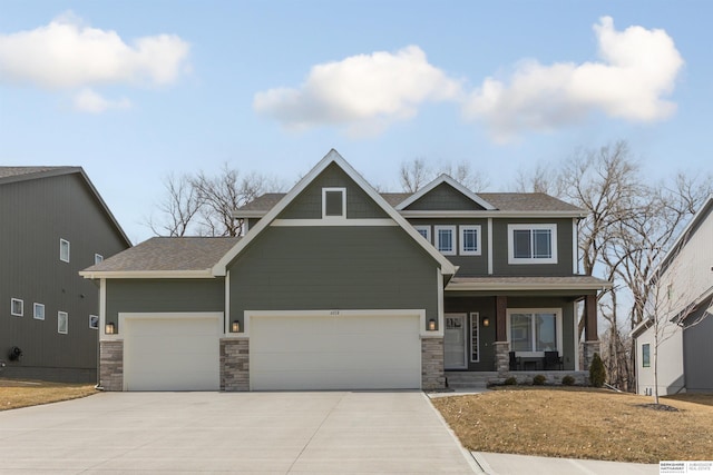 craftsman-style house featuring a shingled roof, a porch, concrete driveway, a garage, and stone siding