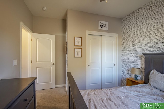 bedroom with a closet and carpet floors