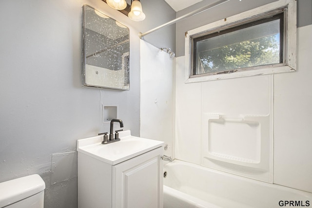 full bathroom featuring vanity, toilet, and shower / bathtub combination