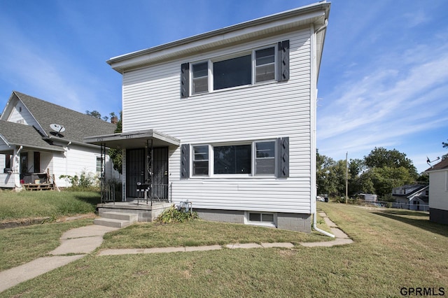 view of front of home with a front yard