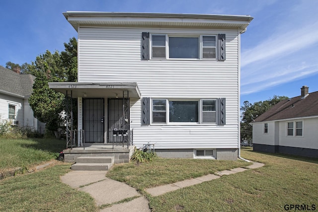 view of front of home with a front yard