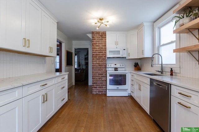 kitchen featuring a sink, decorative backsplash, white cabinets, white appliances, and open shelves