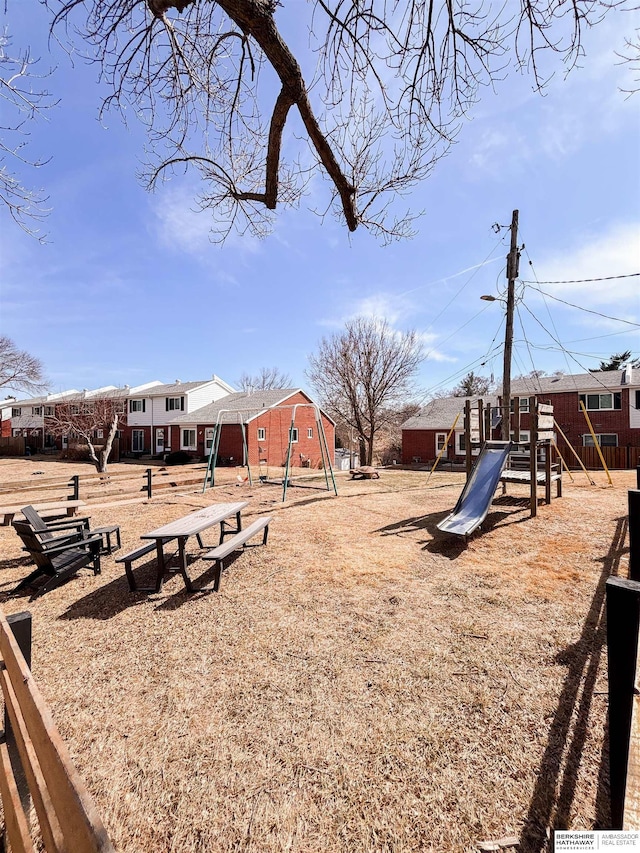 view of yard featuring playground community