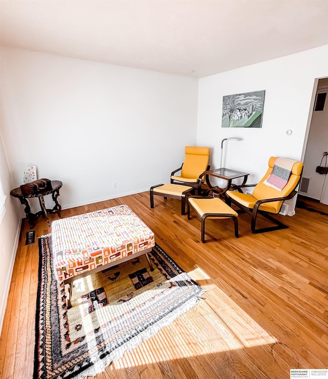 living area featuring wood finished floors