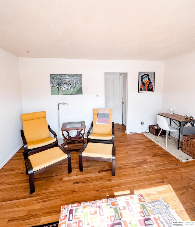 sitting room with wood finished floors