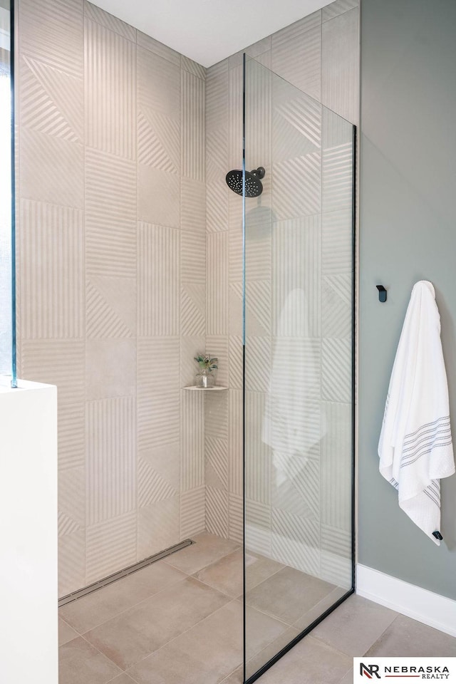 bathroom featuring tile patterned floors and walk in shower