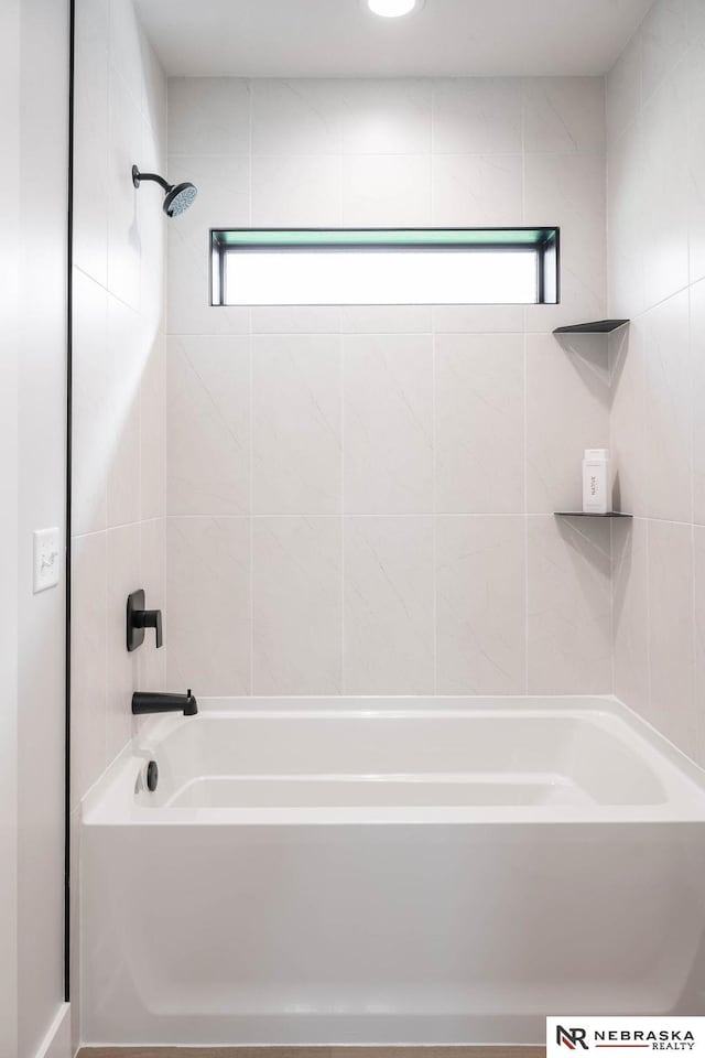 bathroom with shower / bathtub combination