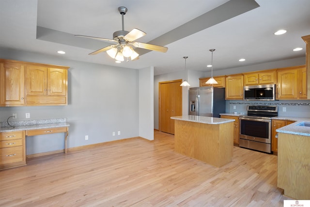 kitchen with light wood-type flooring, a ceiling fan, a center island, recessed lighting, and stainless steel appliances