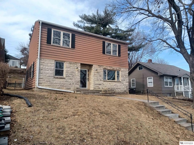 view of front facade with stone siding