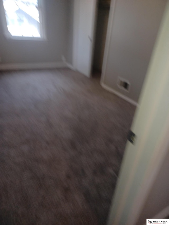 unfurnished bedroom featuring visible vents