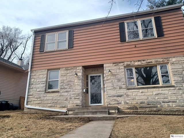 view of front facade featuring stone siding