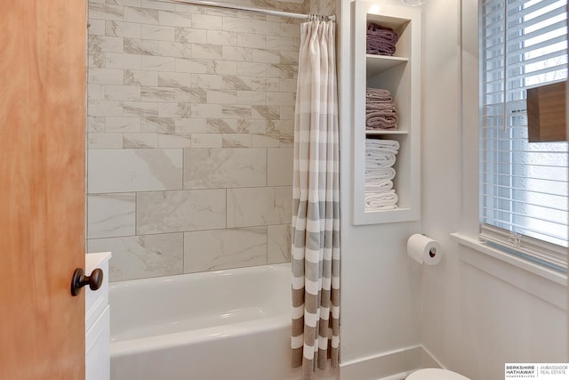 full bathroom with shower / tub combo with curtain