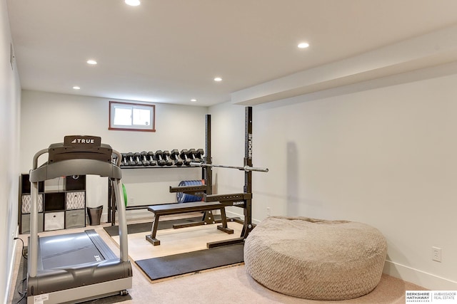 exercise area featuring recessed lighting, carpet, and baseboards