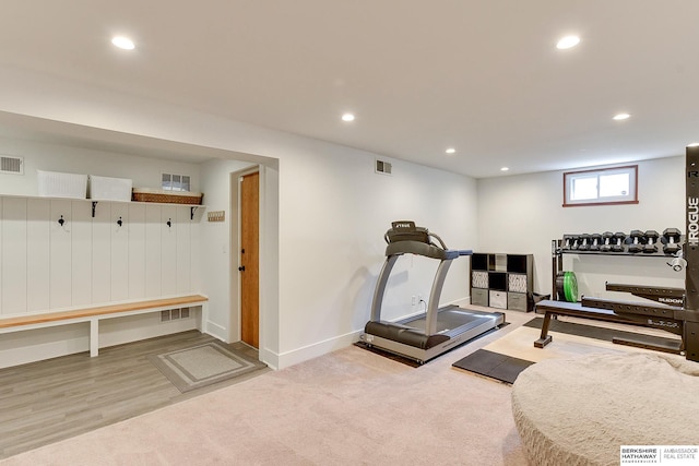 workout area with visible vents, recessed lighting, and carpet floors