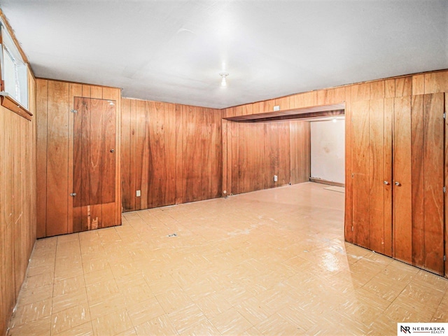 1415 S 12th St, Lincoln, NE 68502 - finished below grade area featuring light floors and wooden walls