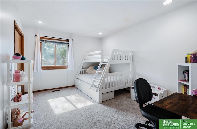 carpeted bedroom featuring recessed lighting, visible vents, and baseboards