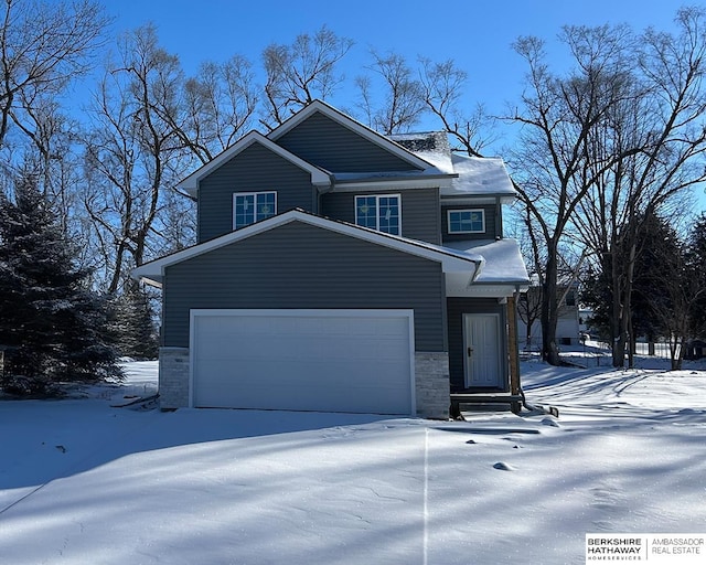 view of front of property with a garage