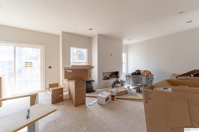 living area featuring plenty of natural light