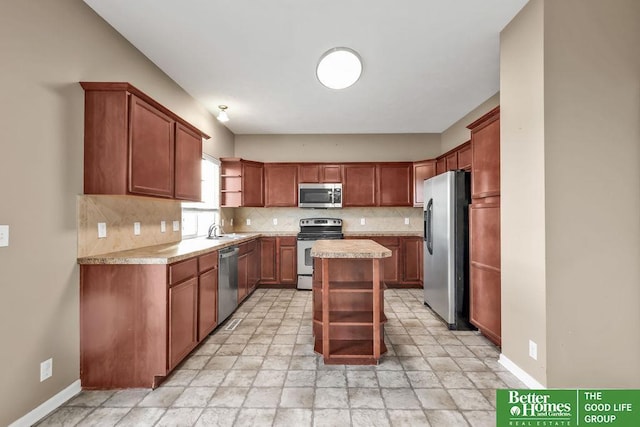 kitchen featuring a sink, open shelves, tasteful backsplash, stainless steel appliances, and light countertops