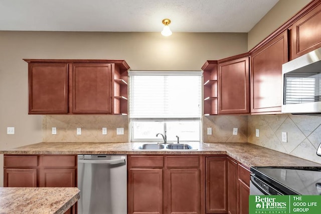 kitchen featuring a sink, open shelves, stainless steel appliances, light countertops, and decorative backsplash