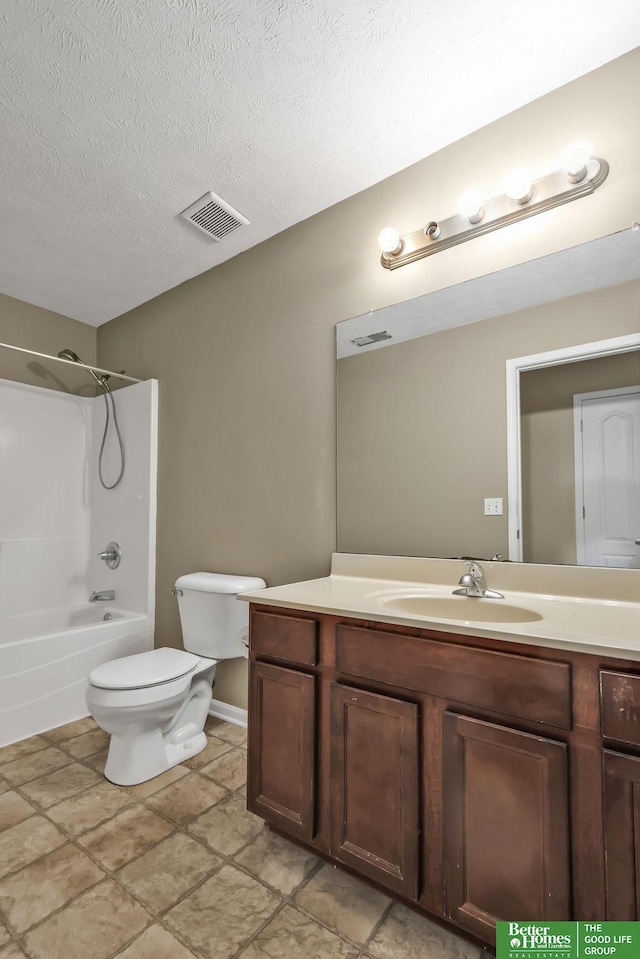 bathroom with visible vents, toilet, a textured ceiling, bathtub / shower combination, and vanity