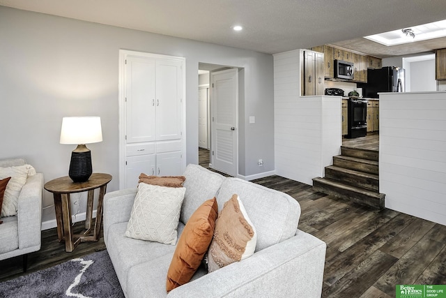 living room featuring recessed lighting, stairway, baseboards, and dark wood-style floors