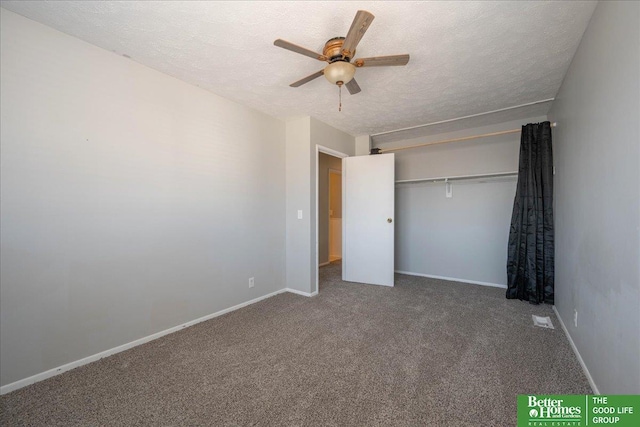 unfurnished bedroom with baseboards, carpet floors, and a textured ceiling