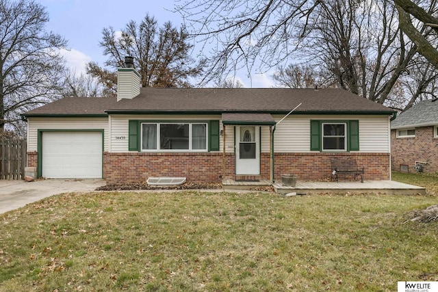 ranch-style home with a front yard, brick siding, concrete driveway, and an attached garage